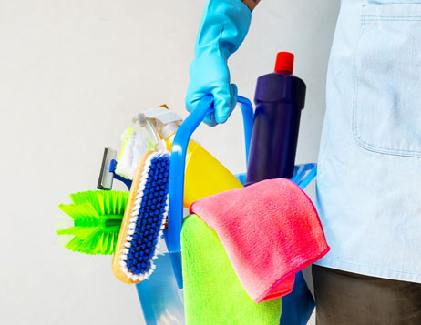 Professional cleaner working in a clean interior
